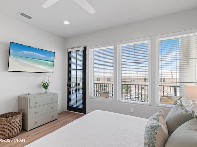 101 Deluna Pl Unit C, Panama City Beach, FL 32413 - bedroom featuring wood finished floors, access to exterior, recessed lighting, baseboards, and ceiling fan