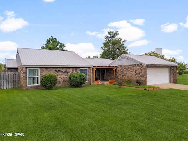 3167 Wood Valley Rd, Panama City, FL 32405 - ranch-style house featuring an attached garage, brick siding, concrete driveway, a metal roof, and a chimney