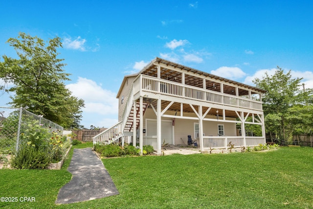 4331 Garrison Rd, Panama City, FL 32404 - back of property featuring stairway and a wooden deck