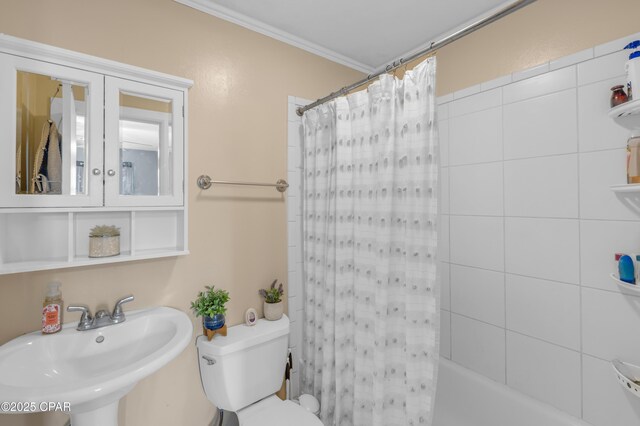 4331 Garrison Rd, Panama City, FL 32404 - bathroom with a sink, toilet, crown molding, and shower / tub combo
