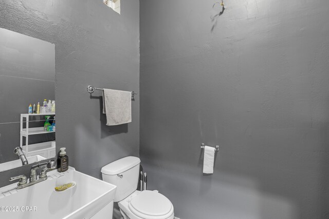 4331 Garrison Rd, Panama City, FL 32404 - bathroom featuring toilet and vanity
