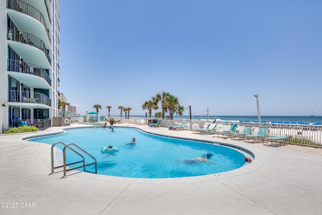 6201 Thomas Dr Unit 202, Panama City Beach, FL 32408 - community pool with a patio and a water view