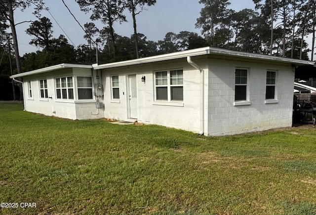 811 Mcgee Rd, Bonifay, FL 32425 - view of front of property featuring concrete block siding and a front yard