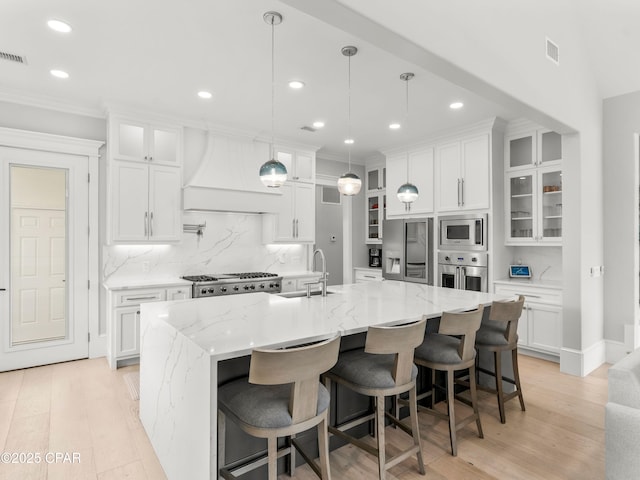 1507 Trout Ln, Panama City Beach, FL 32408 - kitchen with stainless steel appliances, a sink, ornamental molding, recessed lighting, and backsplash