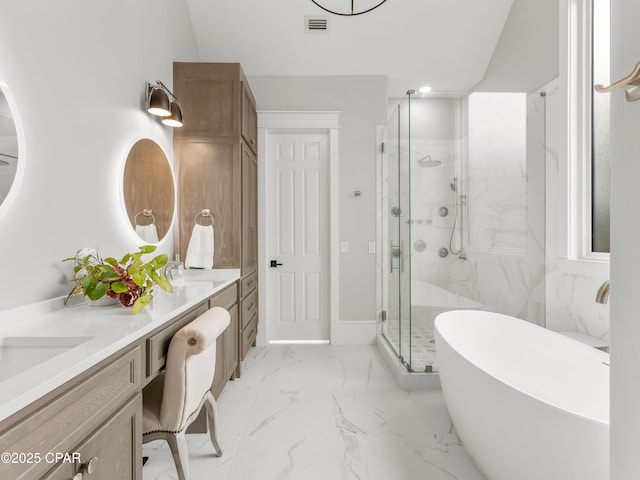 1507 Trout Ln, Panama City Beach, FL 32408 - full bath with double vanity, a marble finish shower, marble tiled floors, and a freestanding tub