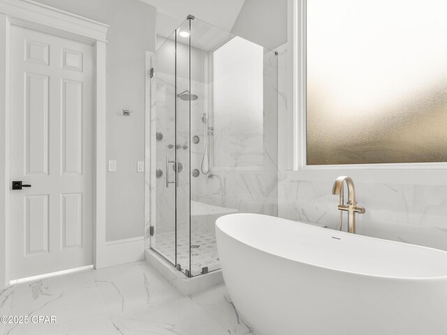1507 Trout Ln, Panama City Beach, FL 32408 - bathroom featuring a marble finish shower, a freestanding tub, and marble finish floors