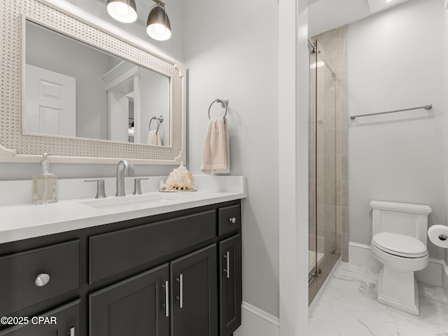 1507 Trout Ln, Panama City Beach, FL 32408 - full bathroom featuring vanity, marble finish flooring, a stall shower, toilet, and baseboards