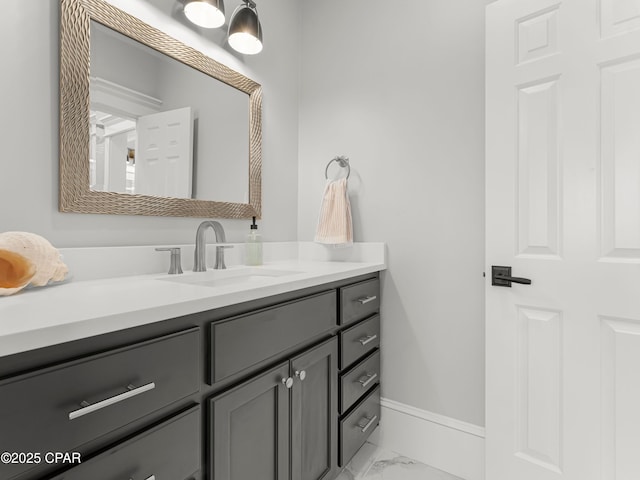 1507 Trout Ln, Panama City Beach, FL 32408 - bathroom with marble look tile flooring, vanity, and baseboards