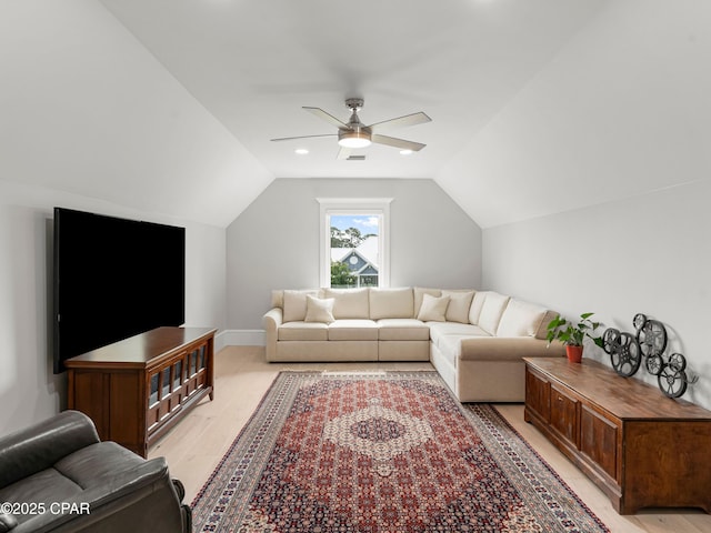 1507 Trout Ln, Panama City Beach, FL 32408 - living room featuring lofted ceiling, ceiling fan, and light wood-style floors