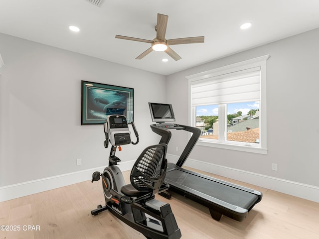 1507 Trout Ln, Panama City Beach, FL 32408 - workout room with a ceiling fan, wood finished floors, recessed lighting, and baseboards