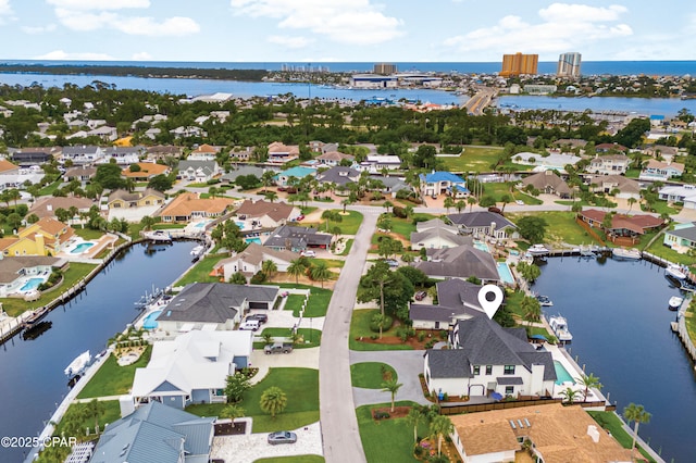 1507 Trout Ln, Panama City Beach, FL 32408 - aerial view of property and surrounding area with a large body of water and nearby suburban area