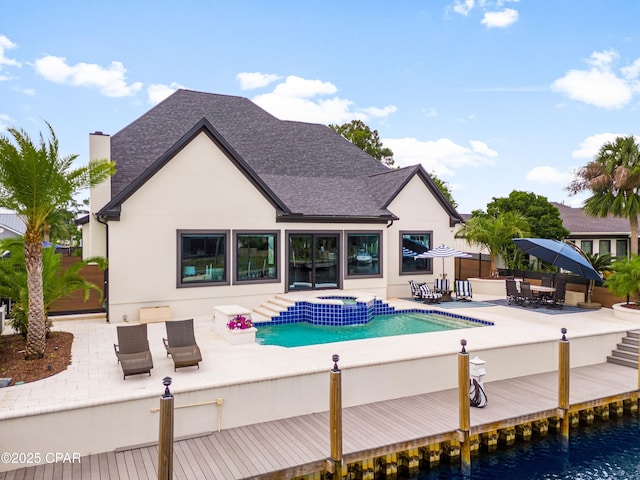 1507 Trout Ln, Panama City Beach, FL 32408 - view of pool featuring a patio, a boat dock, and a pool with connected hot tub