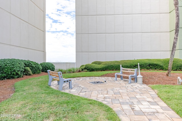 23223 Front Beach Rd Unit A704, Panama City Beach, FL 32413 - view of patio featuring an outdoor fire pit