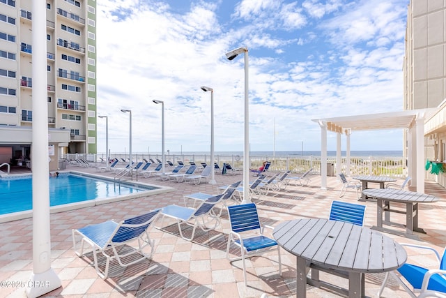23223 Front Beach Rd Unit A704, Panama City Beach, FL 32413 - community pool with a patio area and a pergola