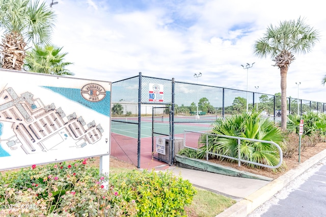 23223 Front Beach Rd Unit A704, Panama City Beach, FL 32413 - view of tennis court featuring a gate