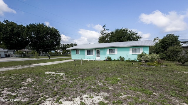 2808 Garrison Ave, Port St Joe, FL 32456 - single story home with metal roof and driveway