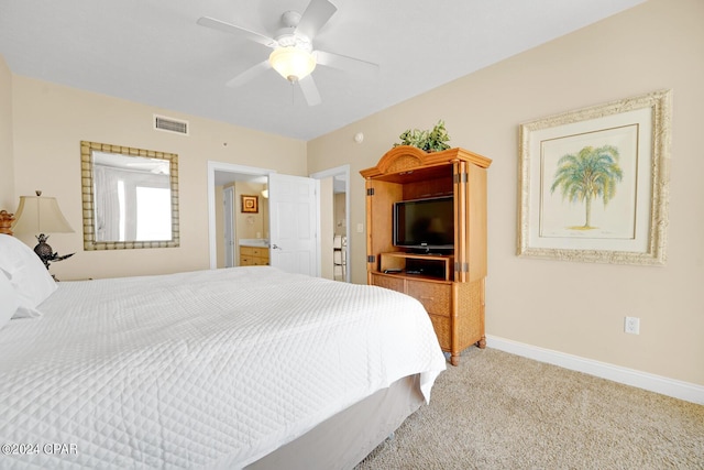 8715 Surf Dr Unit 304B, Panama City, FL 32408 - bedroom with carpet floors and a ceiling fan