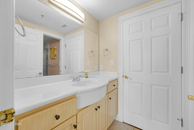 8715 Surf Dr Unit 304B, Panama City, FL 32408 - full bathroom with vanity and tile patterned flooring