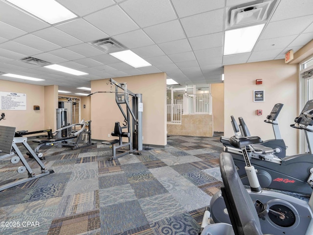 16819 Front Beach Rd Unit 2800, Panama City Beach, FL 32413 - exercise room with a paneled ceiling