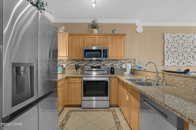 10519 Front Beach Rd Unit 601A, Panama City Beach, FL 32407 - kitchen with appliances with stainless steel finishes, a sink, inlaid floor details, crown molding, and decorative backsplash