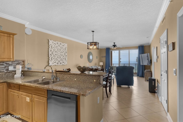 10519 Front Beach Rd Unit 601A, Panama City Beach, FL 32407 - kitchen with stainless steel dishwasher, a sink, a peninsula, ceiling fan, and light tile patterned floors