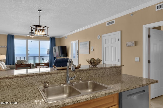 10519 Front Beach Rd Unit 601A, Panama City Beach, FL 32407 - kitchen featuring dishwasher, open floor plan, a sink, a textured ceiling, and ornamental molding