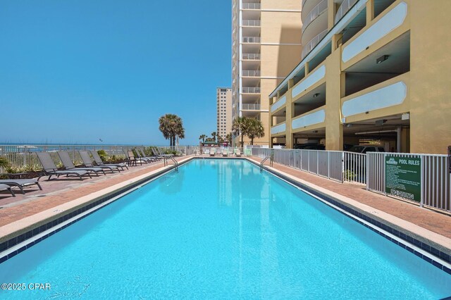 10519 Front Beach Rd Unit 601A, Panama City Beach, FL 32407 - community pool featuring a patio