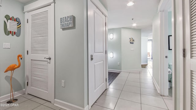 11800 Front Beach Rd Unit 2-201, Panama City Beach, FL 32407 - hallway with light tile patterned flooring, baseboards, and recessed lighting