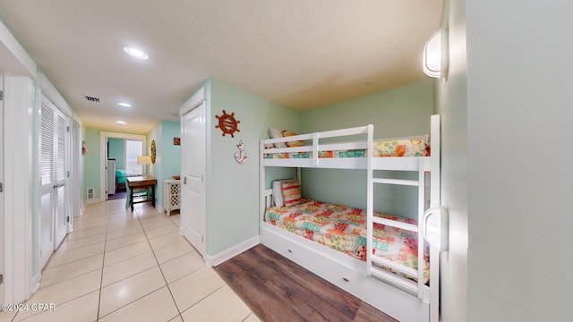 11800 Front Beach Rd Unit 2-201, Panama City Beach, FL 32407 - bedroom with tile patterned floors, recessed lighting, and baseboards