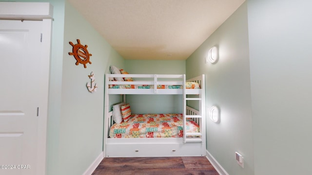 11800 Front Beach Rd Unit 2-201, Panama City Beach, FL 32407 - bedroom with wood finished floors and baseboards