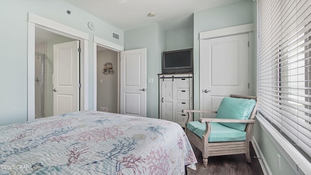 11800 Front Beach Rd Unit 2-201, Panama City Beach, FL 32407 - bedroom with dark wood-style flooring