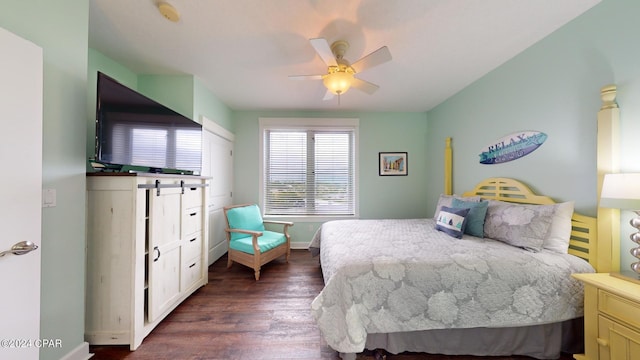 11800 Front Beach Rd Unit 2-201, Panama City Beach, FL 32407 - bedroom with dark wood-type flooring, baseboards, and ceiling fan