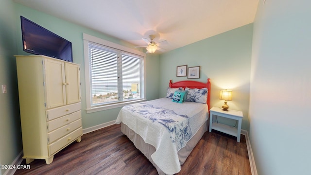 11800 Front Beach Rd Unit 2-201, Panama City Beach, FL 32407 - bedroom with baseboards, dark wood-style flooring, and ceiling fan