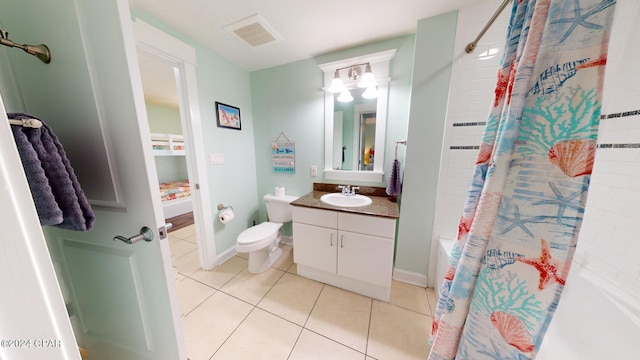 11800 Front Beach Rd Unit 2-201, Panama City Beach, FL 32407 - bathroom featuring shower / bathtub combination with curtain, tile patterned floors, vanity, toilet, and baseboards