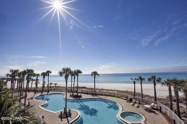 11800 Front Beach Rd Unit 2-201, Panama City Beach, FL 32407 - community pool with view of water and beach, a patio, and a community hot tub