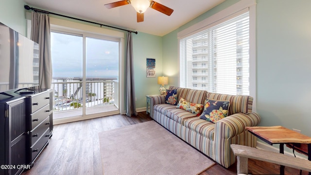 11800 Front Beach Rd Unit 2-201, Panama City Beach, FL 32407 - living area with plenty of natural light, ceiling fan, wood finished floors, and baseboards