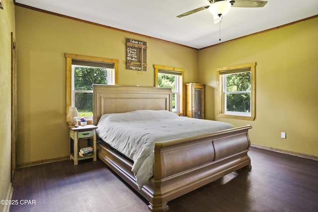 133 Devane Rd, Chattahoochee, FL 32324 - bedroom with multiple windows, baseboards, wood finished floors, and ornamental molding
