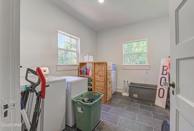 5138 8th Ave, Malone, FL 32445 - laundry room with washer and clothes dryer, dark tile patterned floors, and recessed lighting