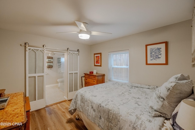 5821 S Lagoon Dr, Panama City, FL 32408 - bedroom featuring light wood-type flooring and ceiling fan