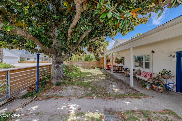 5821 S Lagoon Dr, Panama City, FL 32408 - fenced backyard featuring a patio