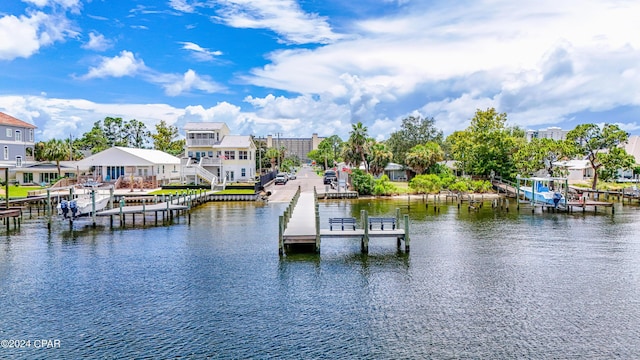5821 S Lagoon Dr, Panama City, FL 32408 - dock featuring a water view and a residential view