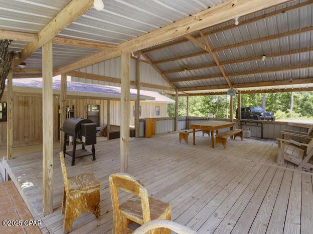 2921 Ambus Ln, Chipley, FL 32428 - wooden terrace featuring grilling area and outdoor dining space