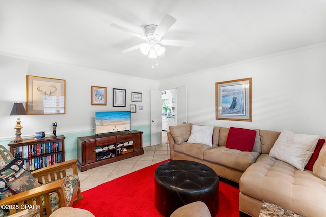 1110 Redfish Cir, Panama City, FL 32408 - living area featuring light tile patterned floors, ceiling fan, and crown molding