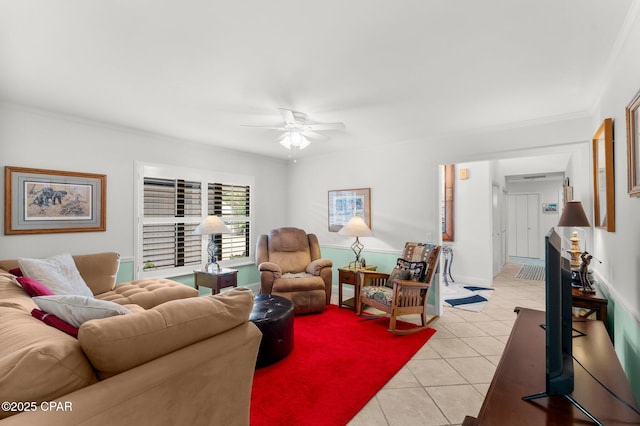 1110 Redfish Cir, Panama City, FL 32408 - living room with light tile patterned flooring, a ceiling fan, and crown molding