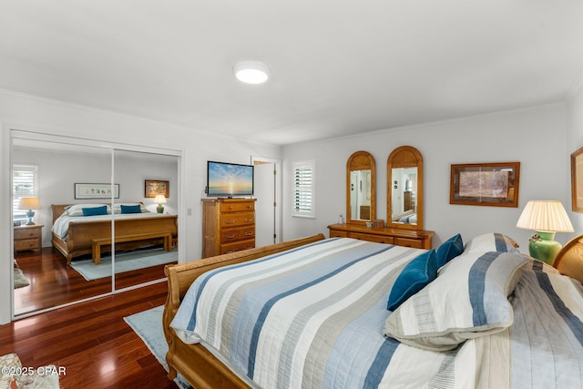 1110 Redfish Cir, Panama City, FL 32408 - bedroom with wood finished floors, a closet, and ornamental molding