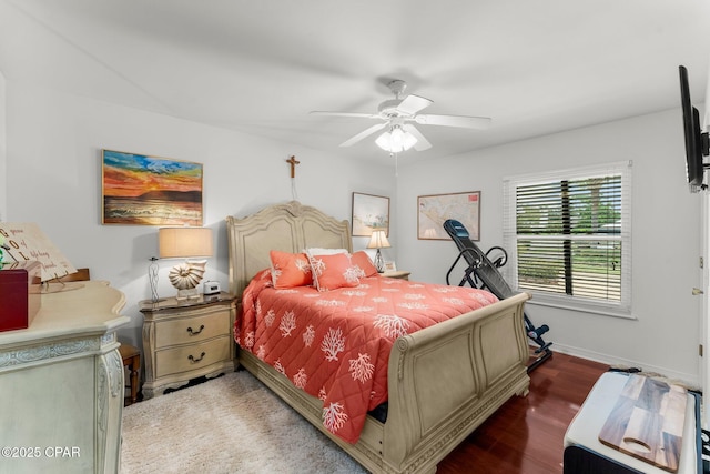 1110 Redfish Cir, Panama City, FL 32408 - bedroom with wood finished floors, a ceiling fan, and baseboards