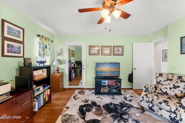 1110 Redfish Cir, Panama City, FL 32408 - living area with wood finished floors and ceiling fan