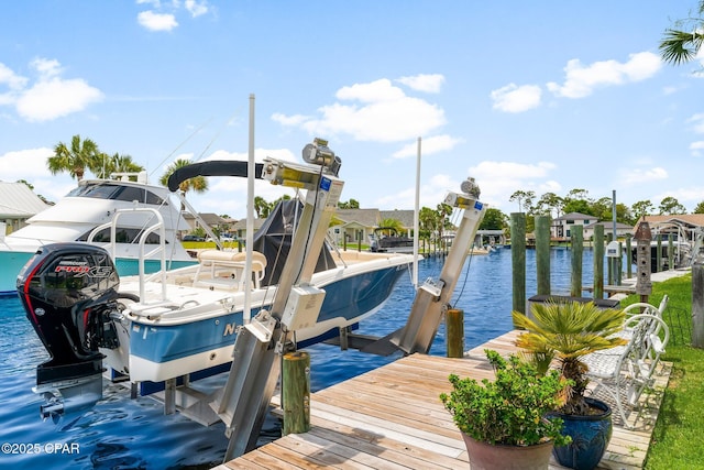 1110 Redfish Cir, Panama City, FL 32408 - dock area with boat lift and a water view