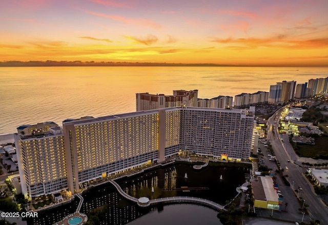 9902 S Thomas Dr Unit 636, Panama City Beach, FL 32408 - aerial view at dusk of a water view and a city view