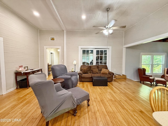 5382 10th St, Malone, FL 32445 - living room with a towering ceiling, ceiling fan, and light wood-type flooring